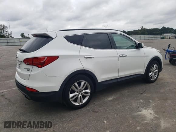 ✅ 2015 Hyundai Santa Fe • VIN: 5XYZW4LA5FG239287 • Лот: 70058543. Опубликован ранее на Copart с пробегом 99 948 миль. Бесплатный доступ к архиву аукционных продаж из США и подробный отчёт об истории автомобиля на DreamBid. Изображение 3.