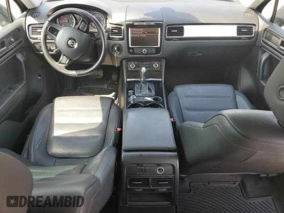 ✅ 2012 Volkswagen Touareg Sport • VIN: WVGFK9BP8CD005071 • Лот: 84914015. Опубликован ранее на Copart с пробегом 193 561 миль. Бесплатный доступ к архиву аукционных продаж из США и подробный отчёт об истории автомобиля на DreamBid. Изображение 8.