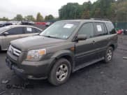 ✅ 2006 Honda Pilot EX-L • VIN: 5FNYF18526B026388 • Лот: 43445325. Опубликован ранее на IAAI с пробегом 129 356 миль. Бесплатный доступ к архиву аукционных продаж из США и подробный отчёт об истории автомобиля на DreamBid. Изображение 17.