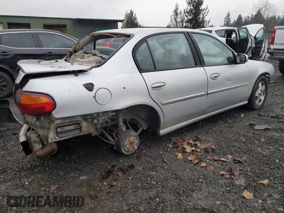 2003 Chevrolet Malibu LS with VIN 1G1NE52J33M604691, listed as a Copart auction lot 84902294 with Not provided miles and Salvage title. Bid and sale history available at DreamBid. Image 3.