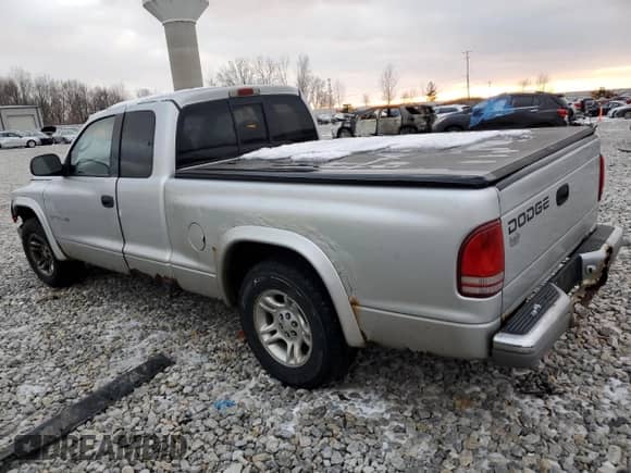 2002 Dodge Dakota SLT с VIN 1B7GL42N62S505411, выставлен на аукционе Copart как лот 48993274 с пробегом 107 528 миль миль и На запчасти • Non repairable. История ставок и продаж доступна на DreamBid. Изображение 2.
