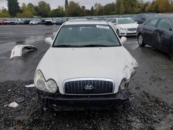 2002 Hyundai Sonata with VIN KMHWF25S02A673104, listed as a Copart auction lot 75429284 with 101,568 mi miles and Salvage title. Bid and sale history available at DreamBid. Image 5.