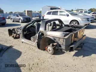 2002 Chevrolet Corvette z VIN 1G1YY22G725121172, wystawiony jako Copart lot #73237894 z przebiegiem Nie podano mil oraz Szkoda całkowita • Salvage title. Historia ofert i sprzedaży dostępna na DreamBid. Obrazek 2.