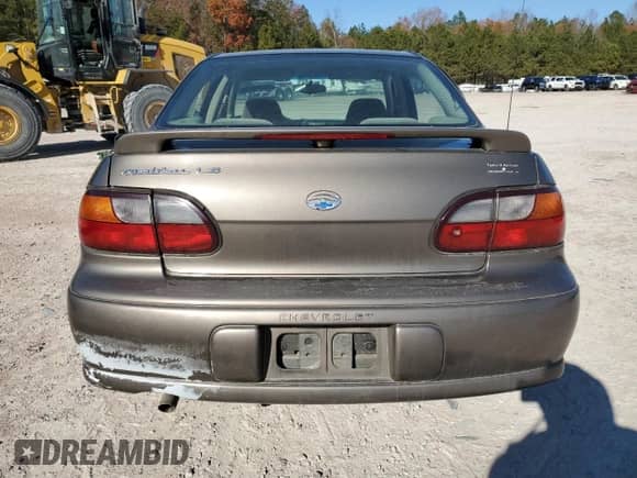 2000 Chevrolet Malibu LS z VIN 1G1NE52J4Y6303956, wystawiony jako Copart lot #83049134 z przebiegiem 146 425 mil mil oraz Czysty tytuł • Clean title. Historia ofert i sprzedaży dostępna na DreamBid. Obrazek 6.