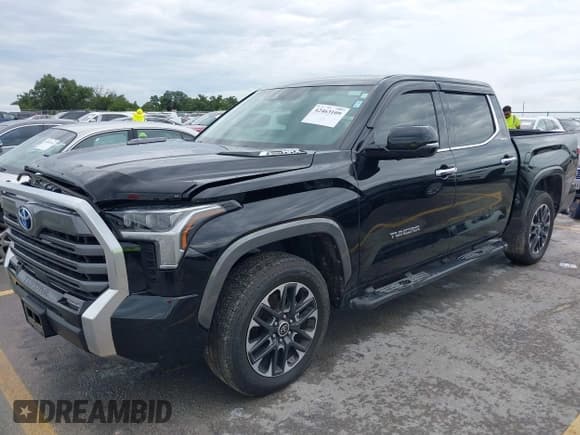 ✅ 2024 Toyota Tundra Limited Hybrid • VIN: 5TFJC5DB6RX050717 • Lot: 42463109. Listed on IAAI with 11,336 mi. Free auction sales archive from the USA and detailed vehicle history report at DreamBid. Image 2.