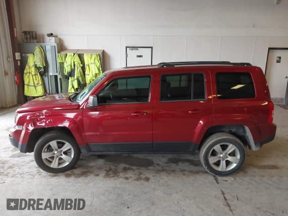 ✅ 2014 Jeep Patriot Latitude • VIN: 1C4NJRFB1ED713506 • Lot: 42176696. Listed on IAAI with 118,509 mi. Free auction sales archive from the USA and detailed vehicle history report at DreamBid. Image 14.