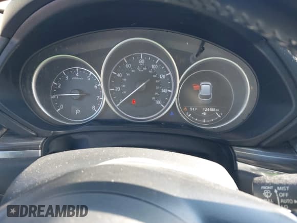 ✅ 2018 Mazda CX-5 Grand Touring • VIN: JM3KFBDM6J0473734 • Лот: 43536049. Опубликован ранее на IAAI с пробегом 124 488 миль. Бесплатный доступ к архиву аукционных продаж из США и подробный отчёт об истории автомобиля на DreamBid. Изображение 7.