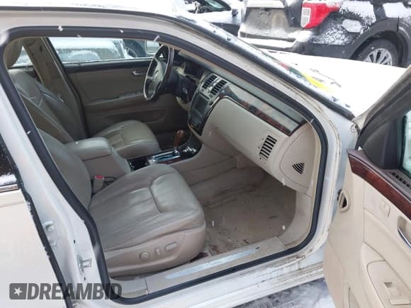 ✅ 2009 Cadillac DTS 1SA • VIN: 1G6KD57Y69U125633 • Лот: 41332008. Опубликован ранее на IAAI с пробегом 171 086 миль. Бесплатный доступ к архиву аукционных продаж из США и подробный отчёт об истории автомобиля на DreamBid. Изображение 5.