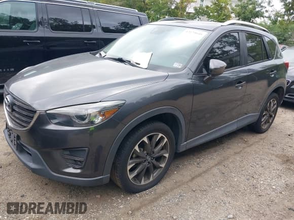 ✅ 2016 Mazda CX-5 Grand Touring • VIN: JM3KE2DY6G0840159 • Lot: 43179646. Wystawiony na IAAI z przebiegiem 71 500 mil. Bezpłatny archiwum sprzedaży aukcyjnych z USA i szczegółowy raport historii pojazdu na DreamBid. Zdjęcie 2.