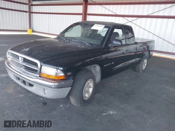 ✅ 2000 Dodge Dakota • VIN: 1B7GL22X2YS587619 • Lot: 43484603. Listed on IAAI with 230,262 mi. Free auction sales archive from the USA and detailed vehicle history report at DreamBid. Image 2.