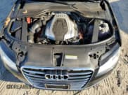 ✅ 2015 Audi A8 3.0T • VIN: WAU3GAFD1FN017875 • Лот: 88210815. Опубликован ранее на Copart с пробегом 124 720 миль. Бесплатный доступ к архиву аукционных продаж из США и подробный отчёт об истории автомобиля на DreamBid. Изображение 11.