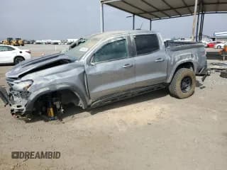 ✅ 2023 Chevrolet Colorado 4WD ZR2 • VIN: 1GCPTFEK5P1235565 • Лот: 61607045. Опубликован ранее на Copart с пробегом 42 500 миль. Бесплатный доступ к архиву аукционных продаж из США и подробный отчёт об истории автомобиля на DreamBid. Изображение 1.