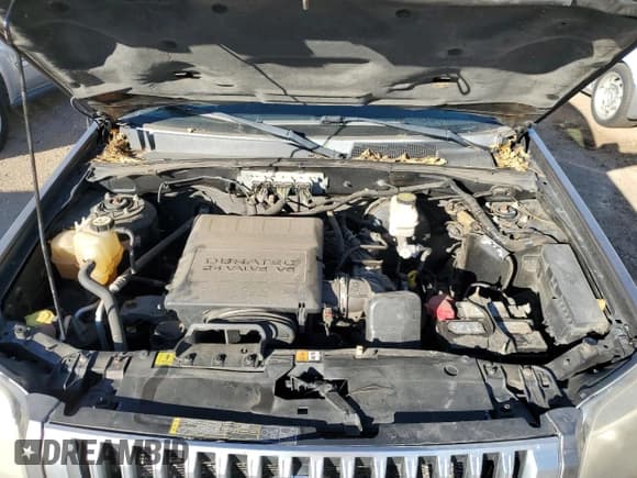 ✅ 2011 Mercury Mariner Premier • VIN: 4M2CN8HG2BKJ08023 • Lot: 91724555. Wystawiony na Copart z przebiegiem 175 110 mil. Bezpłatny archiwum sprzedaży aukcyjnych z USA i szczegółowy raport historii pojazdu na DreamBid. Zdjęcie 11.