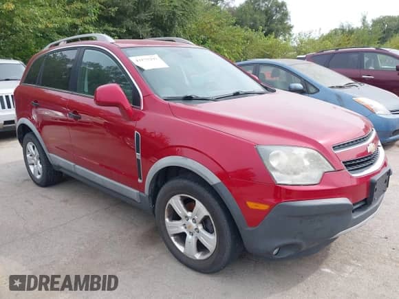 2015 Chevrolet Captiva Sport LS z VIN 3GNAL2EK0FS517227, wystawiony jako IAAI lot #43175297 z przebiegiem 164 689 mil mil oraz . Historia ofert i sprzedaży dostępna na DreamBid. Obrazek 1.