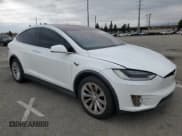 ✅ 2018 Tesla Model X 75D • VIN: 5YJXCAE26JF111662 • Lot: 54129765. Listed on Copart with 88,553 mi. Free auction sales archive from the USA and detailed vehicle history report at DreamBid. Image 4.