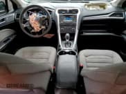 ✅ 2016 Ford Fusion S Hybrid • VIN: 3FA6P0UU1GR118805 • Lot: 93336205. Wystawiony na Copart z przebiegiem 141 238 mil. Bezpłatny archiwum sprzedaży aukcyjnych z USA i szczegółowy raport historii pojazdu na DreamBid. Zdjęcie 8.