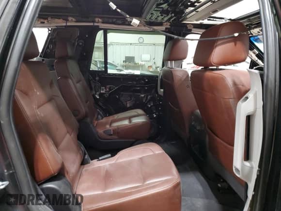 2020 Chevrolet Tahoe Premier with VIN 1GNSKCKJ7LR104163, listed as a Copart auction lot 49161335 with 66,135 mi miles and Salvage title. Bid and sale history available at DreamBid. Image 11.