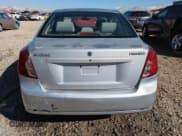 ✅ 2005 Suzuki Forenza S • VIN: KL5JD56Z45K144227 • Lot: 46600015. Listed on Copart with 163,677 mi. Free auction sales archive from the USA and detailed vehicle history report at DreamBid. Image 6.