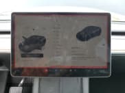 ✅ 2023 Tesla Model Y • VIN: 7SAYGDED1PF941165 • Lot: 71301845. Listed on Copart with 18,142 mi. Free auction sales archive from the USA and detailed vehicle history report at DreamBid. Image 9.