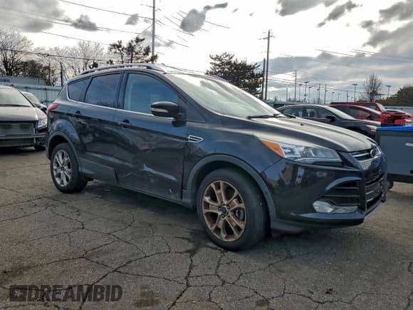 ✅ 2015 Ford Escape Titanium • VIN: 1FMCU9J98FUB59266 • Лот: 94506695. Опубликован ранее на Copart с пробегом 123 503 миль. Бесплатный доступ к архиву аукционных продаж из США и подробный отчёт об истории автомобиля на DreamBid. Изображение 4.
