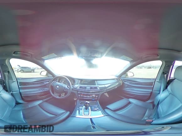 ✅ 2014 BMW 7 Series 750i • VIN: WBAYA8C53ED499850 • Lot: 43049625. Wystawiony na Copart z przebiegiem 85 780 mil. Bezpłatny archiwum sprzedaży aukcyjnych z USA i szczegółowy raport historii pojazdu na DreamBid. Zdjęcie 12.