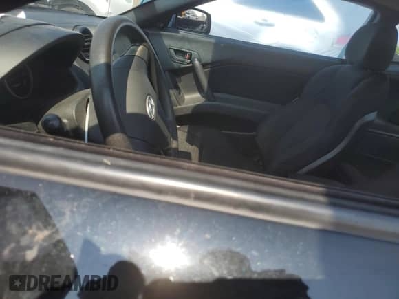 2008 Hyundai Tiburon GS с VIN KMHHM66D88U288354, выставлен на аукционе Copart как лот 59240385 с пробегом 106 687 миль миль и Списание • Salvage title. История ставок и продаж доступна на DreamBid. Изображение 7.