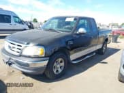✅ 1999 Ford F-150 XL • VIN: 2FTRX17L7XCA75886 • Lot: 42831089. Listed on IAAI with Not provided. Free auction sales archive from the USA and detailed vehicle history report at DreamBid. Image 2.