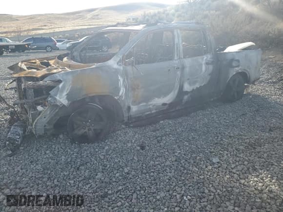 ✅ 2022 Honda Ridgeline RTL-E • VIN: 5FPYK3F74NB010596 • Lot: 90921415. Listed on Copart with Not provided. Free auction sales archive from the USA and detailed vehicle history report at DreamBid. Image 1.