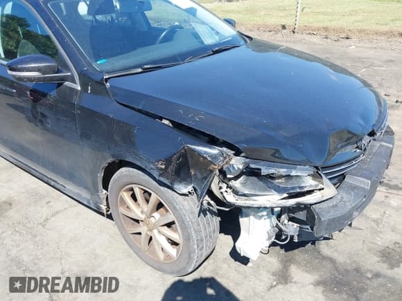 ✅ 2014 Volkswagen Jetta SE • VIN: 3VWD17AJ6EM380039 • Lot: 43098623. Listed on IAAI with 143,104 mi. Free auction sales archive from the USA and detailed vehicle history report at DreamBid. Image 12.