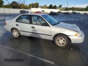 ✅ 2002 Chevrolet Prizm • VIN: 1Y1SK52842Z404089 • Lot: 49103545. Listed on Copart with 134,794 mi. Free auction sales archive from the USA and detailed vehicle history report at DreamBid. Image 4.