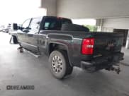 ✅ 2017 GMC Sierra 2500HD Denali • VIN: 1GT12UEY4HF187918 • Лот: 42384580. Опубликован ранее на IAAI с пробегом 117 034 миль. Бесплатный доступ к архиву аукционных продаж из США и подробный отчёт об истории автомобиля на DreamBid. Изображение 3.