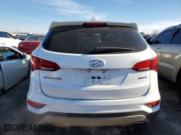 ✅ 2017 Hyundai Santa Fe 2.4L • VIN: 5XYZT3LB2HG394376 • Lot: 69557252. Wystawiony na Copart z przebiegiem 79 000 mil. Bezpłatny archiwum sprzedaży aukcyjnych z USA i szczegółowy raport historii pojazdu na DreamBid. Zdjęcie 6.