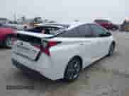 2021 Toyota Prius L Eco with VIN JTDKAMFU6M3137679, listed as a IAAI auction lot 42488129 with 52,414 mi miles and . Bid and sale history available at DreamBid. Image 4.