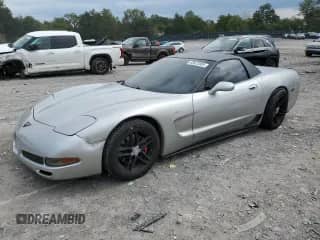2004 Chevrolet Corvette Z06 with VIN 1G1YY12S845104706, listed as a Copart auction lot 83872505 with 95,360 mi miles and Salvage title. Bid and sale history available at DreamBid. Image 1.