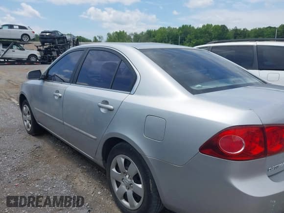 ✅ 2006 Kia Optima LX • VIN: KNAGE123X65039782 • Lot: 42294795. Listed on IAAI with Not provided. Free auction sales archive from the USA and detailed vehicle history report at DreamBid. Image 3.