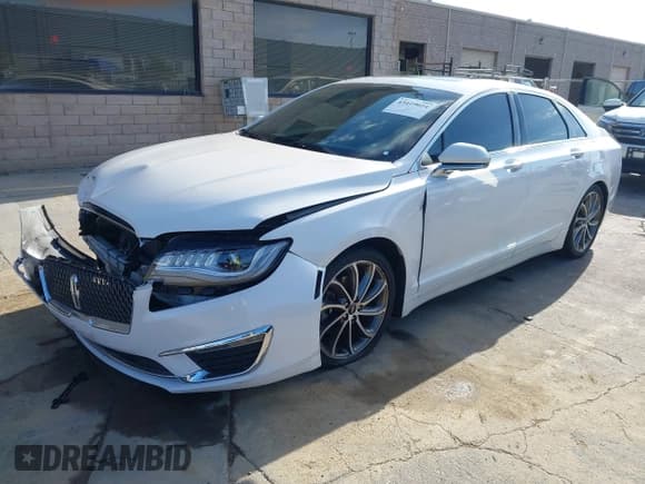 ✅ 2019 Lincoln MKZ Hybrid Reserve I • VIN: 3LN6L5LU7KR631615 • Лот: 43419024. Опубликован ранее на IAAI с пробегом 233 492 миль. Бесплатный доступ к архиву аукционных продаж из США и подробный отчёт об истории автомобиля на DreamBid. Изображение 17.