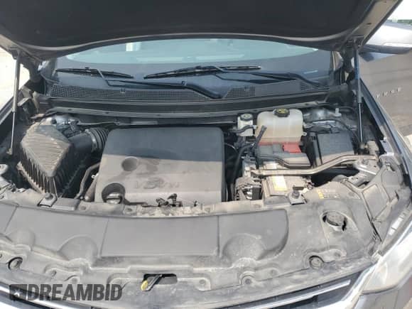 2021 Chevrolet Traverse LT with VIN 1GNEVHKW2MJ216527, listed as a Copart auction lot 60195885 with 103,141 mi miles and Salvage title. Bid and sale history available at DreamBid. Image 12.