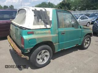✅ 1994 Geo Tracker • VIN: 2CNBE18U4R6933505 • Lot: 68421924. Wystawiony na Copart z przebiegiem 203 558 mil. Bezpłatny archiwum sprzedaży aukcyjnych z USA i szczegółowy raport historii pojazdu na DreamBid. Zdjęcie 3.