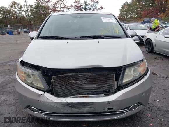 ✅ 2014 Honda Odyssey Touring • VIN: 5FNRL5H90EB105838 • Lot: 43594038. Listed on IAAI with 97,956 mi. Free auction sales archive from the USA and detailed vehicle history report at DreamBid. Image 6.