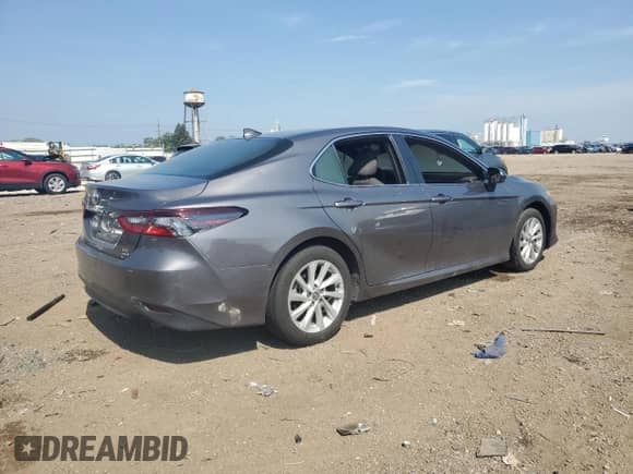 2023 Toyota Camry LE с VIN 4T1C11BK0PU083345, выставлен на аукционе Copart как лот 65721765 с пробегом Не указан миль и Списание • Salvage title. История ставок и продаж доступна на DreamBid. Изображение 3.