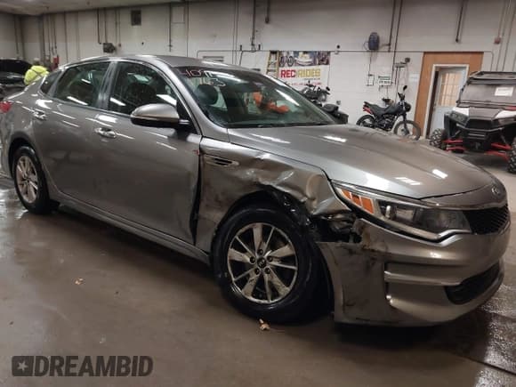 ✅ 2016 Kia Optima LX • VIN: 5XXGT4L30GG015741 • Lot: 40911763. Listed on IAAI with 142,772 mi. Free auction sales archive from the USA and detailed vehicle history report at DreamBid. Image 6.