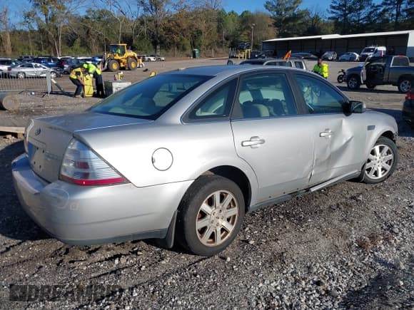 ✅ 2009 Ford Taurus SE • VIN: 1FAHP23W79G118390 • Lot: 40930355. Listed on IAAI with 246,400 mi. Free auction sales archive from the USA and detailed vehicle history report at DreamBid. Image 4.