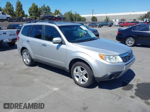 ✅ 2009 Subaru Forester X • VIN: JF2SH63649H793291 • Lot: 43007419. Listed on IAAI with 173,362 mi. Free auction sales archive from the USA and detailed vehicle history report at DreamBid. Image 1.