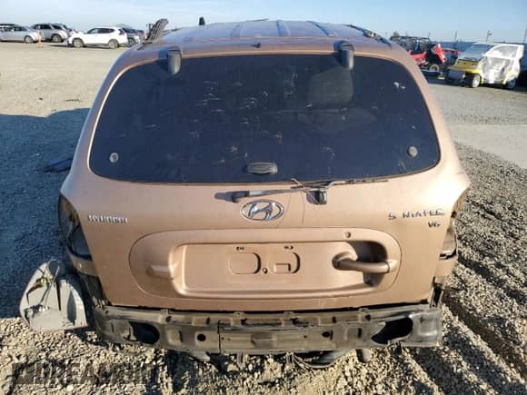 2002 Hyundai Santa Fe GLS z VIN KM8SC13D52U181981, wystawiony jako Copart lot #41909695 z przebiegiem Nie podano mil oraz Szkoda całkowita • Salvage title. Historia ofert i sprzedaży dostępna na DreamBid. Obrazek 6.