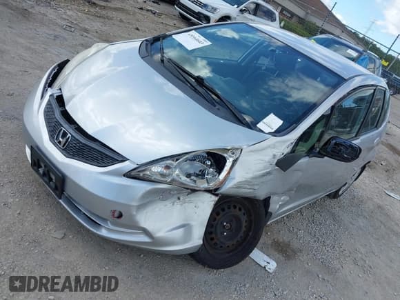 ✅ 2013 Honda Fit • VIN: JHMGE8H35DC047993 • Lot: 43164603. Listed on IAAI with 80,004 mi. Free auction sales archive from the USA and detailed vehicle history report at DreamBid. Image 2.