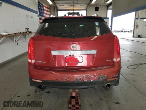✅ 2012 Cadillac SRX Premium Collection • VIN: 3GYFNFE32CS656032 • Lot: 70530055. Wystawiony na Copart z przebiegiem 53 556 mil. Bezpłatny archiwum sprzedaży aukcyjnych z USA i szczegółowy raport historii pojazdu na DreamBid. Zdjęcie 6.