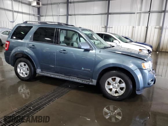 ✅ 2012 Ford Escape Hybrid • VIN: 1FMCU5K33CKB39548 • Lot: 65647465. Wystawiony na Copart z przebiegiem 126 217 mil. Bezpłatny archiwum sprzedaży aukcyjnych z USA i szczegółowy raport historii pojazdu na DreamBid. Zdjęcie 4.