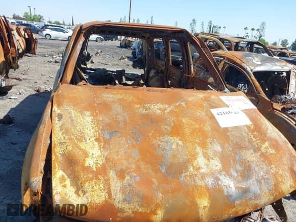 2005 Chevrolet Tahoe LT with VIN 1GNEC13T35R103223, listed as a IAAI auction lot 42165644 with Not provided miles and . Bid and sale history available at DreamBid. Image 14.