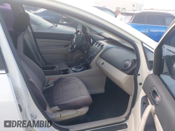 ✅ 2010 Mazda CX-7 SV • VIN: JM3ER2WM3A0324599 • Lot: 42810172. Listed on IAAI with 87,728 mi. Free auction sales archive from the USA and detailed vehicle history report at DreamBid. Image 5.