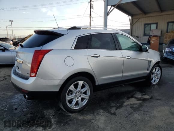 ✅ 2016 Cadillac SRX Performance Collection • VIN: 3GYFNCE34GS576431 • Lot: 81131595. Listed on Copart with 92,943 mi. Free auction sales archive from the USA and detailed vehicle history report at DreamBid. Image 3.
